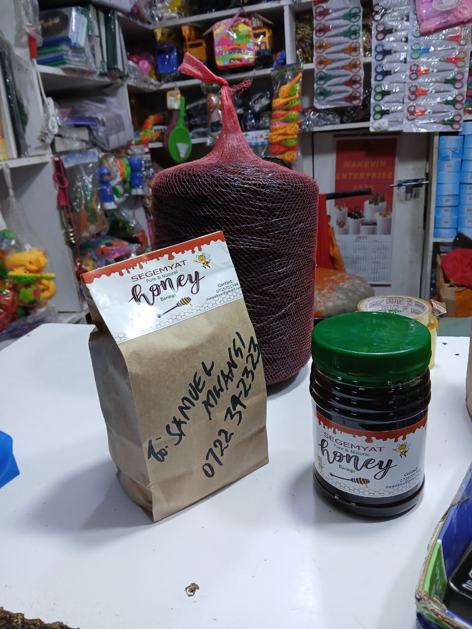 Happy client making honey concoction